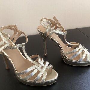 Gold platform sandal heels size 8.